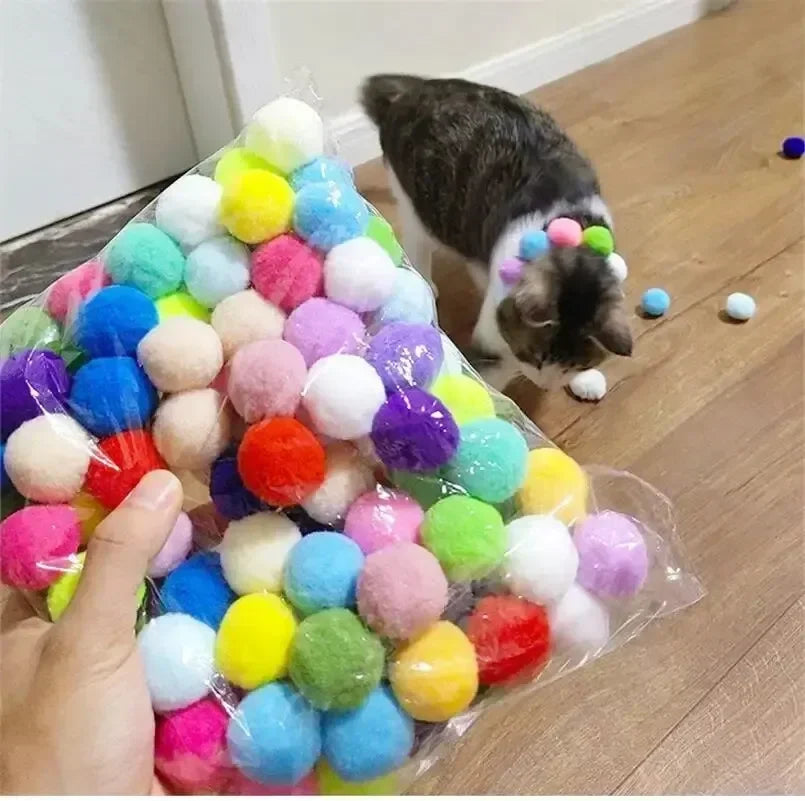 Juguete para gatos: pistola y pelotas